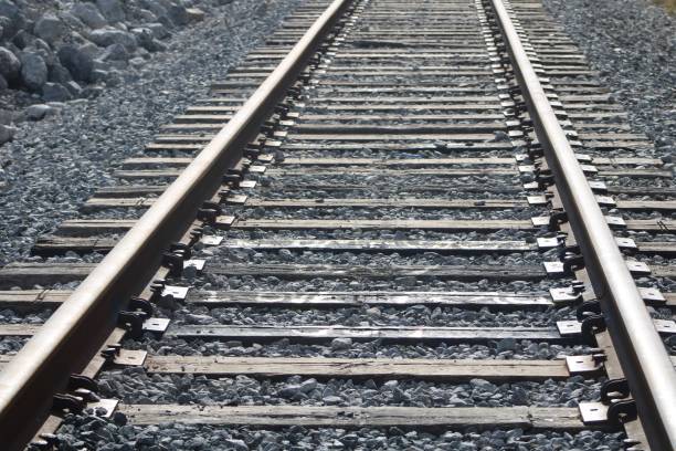 istock Train Tracks Close Up fading in the distance 1930553909