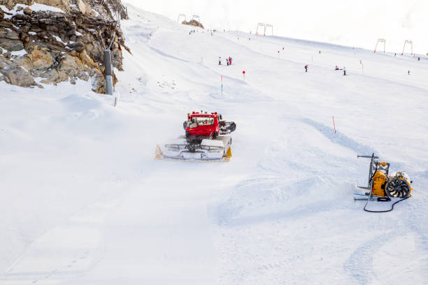 snowcat grooming ski slope