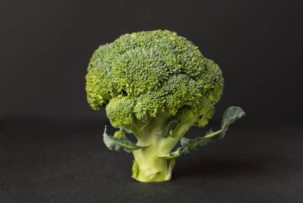 istock Fresh tasty broccoli on wooden table 1930645092
