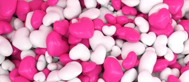 istock background full of white and pink hearts 1930650785