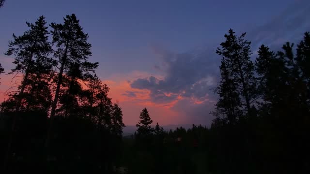 Timelapse of colorful summer sunset in Tabernash, Colorado fading into darkness 4K.