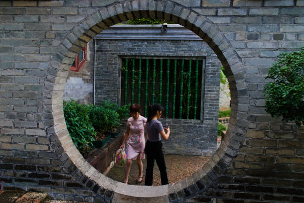 Dongguan, Guangdong Province, China, Oct 28, 2023: A circle shape door in the garden.