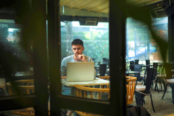 Young Businessman, Freelancer, Working with Laptop in Cafe, Using Internet, Online Shopping, Online Education