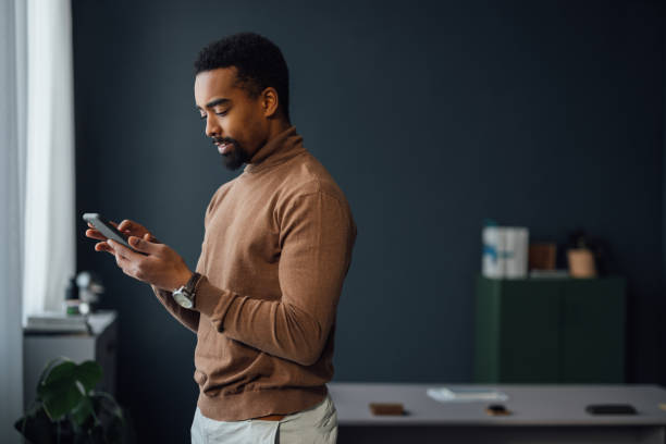 istock Businessman on Mobile Phone at Office 1930805094