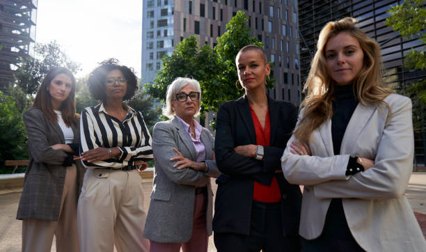 istock Confident group of multiethnic businesswomen looking at camera seriously. 1930841448