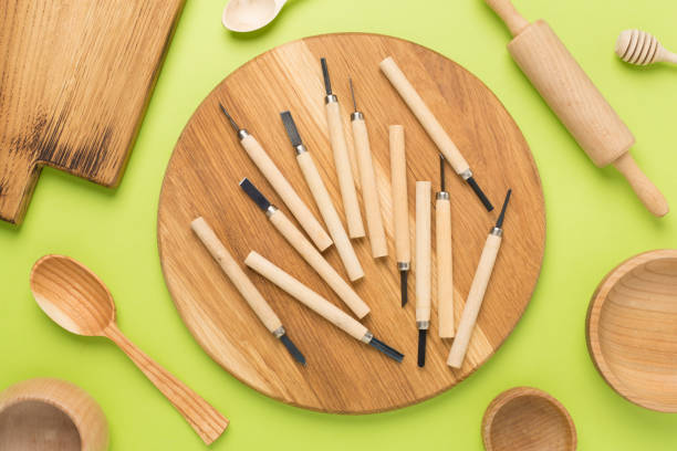 istock Carpenter tools with wooden objects on color background ,top view 1930862209