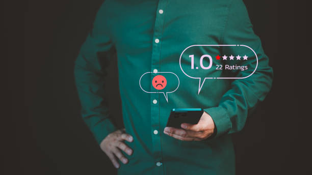 istock Customer review and feedback with rate 1 star on virtual screen. Assessment testimonial review for dislike service and low quality. Business concept of customer experience dissatisfied by smartphone. 1930869957