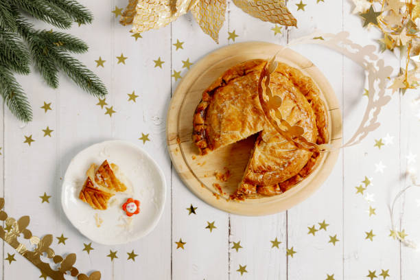 istock One cut royal galette with a crown and a surprise on the table. 1930909613