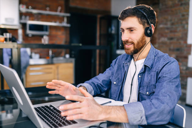 istock call center worker working together with a smile on his face usi 1930972282