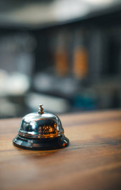 istock Hospitality at Your Service: A front desk bell on a hotel reception counter or restaurant kitchen 1930980336