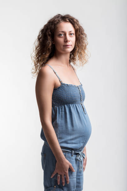 istock Future mom cradles belly, peaceful and happy 1930994688