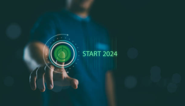 Businessman touching on virtual screen start button for 2024 New Year, Start new year 2024 with goal plan, goal concept, action plan, strategy, new year business vision. New start up business.