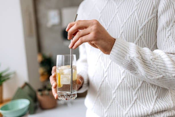 istock Taking ice out of drink after toothache 1931063822