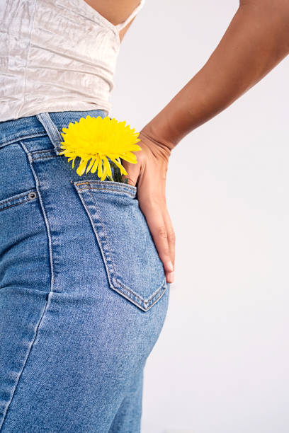istock Jeans pocket with blooming flower. Floral chic. 1931117315