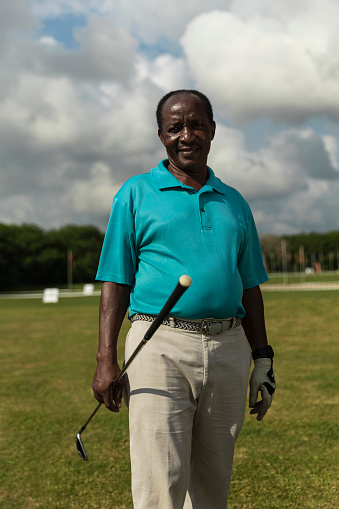 Portrait of senior golfer