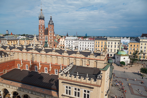 The twin towers facade of St Mary Basilica and the market square, Krakow, Poland