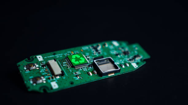 istock Green recycle sign on circuit board technology innovations on dark background, Concept of green technology, Environment Green Technology Computer Chip, Green Computing and Technology, CSR, Esg. 1931405587