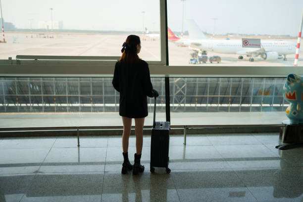 istock Business woman in the terminal 1931407781