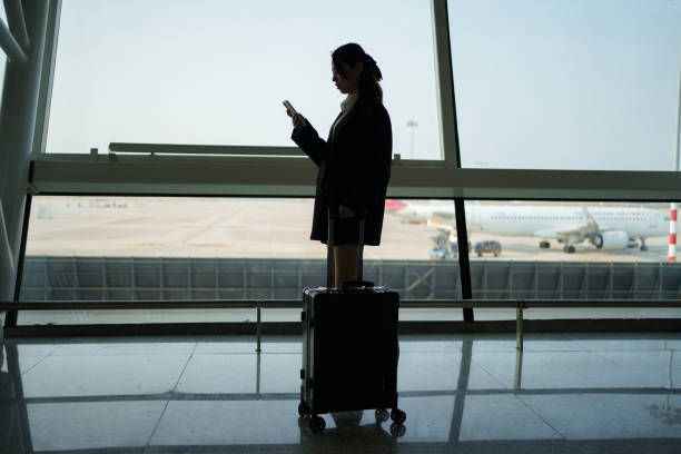 istock business woman using smartphone 1931414524