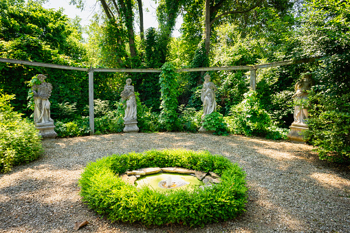 Hedges and goddess sculptures at the Weber estate, Illinois, USA