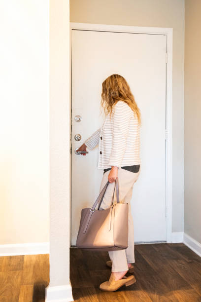 istock Female leaving for work from her apartment 1931585183
