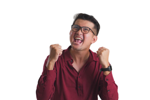 istock Asian man in extreme joy isolated on white background. 1931608933