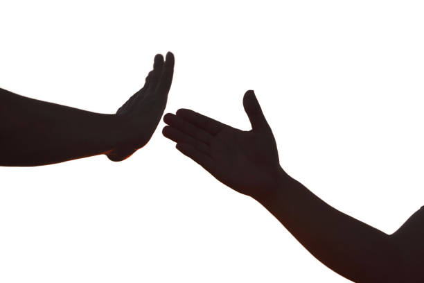 Hand silhouette , gesture signal, refusal of help isolated on white background.