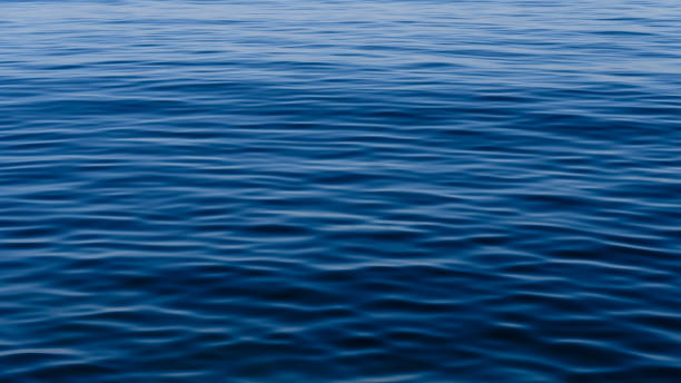 istock Sea Blue Ocean with soft gentle ripples on the top surface texture with summer sunlight refracting 1931719515