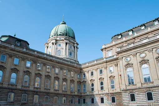 Vienna, Austria - October 06, 2021: Magnificent cascading fountains and sumptuous marble antique statues in the park of the Belvedere Palace in Vienna, the capital of Austria. Autumn rainy weather in Europe. Popular tourist and historical attraction, baroque architecture