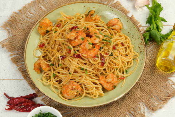 istock Homemade Italian Spaghetti Algio e Olio with Garlic and chilli flakes 1931751529