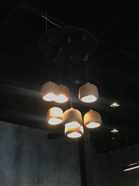 istock Modern electric lamps hanging on ceiling 1931761926