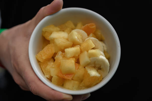 A bowl full of exotic fruits