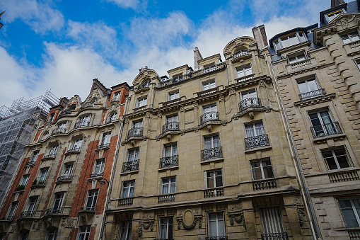 Paris, typical facade and windows, beautiful building rue Reaumur