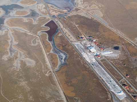 Salt factory and Flats. Salt Lake (Tuz Gölü) located at the intersection of Ankara, Konya and Aksaray provinces in the Central Anatolian Region of Türkiye. Taken via drone.