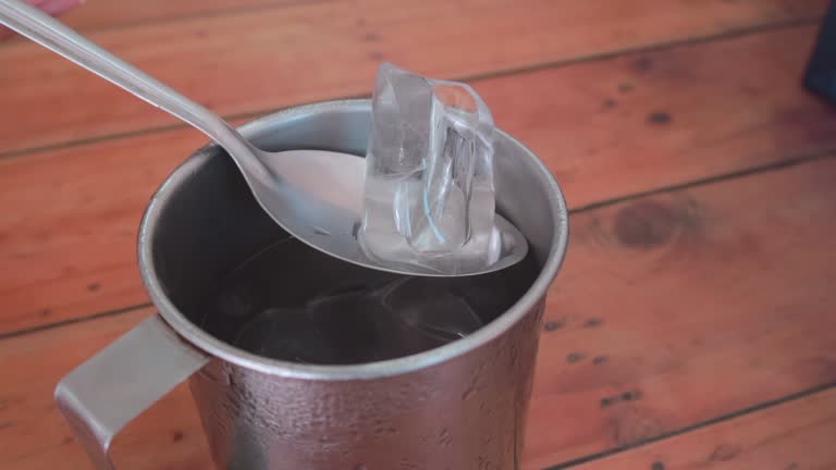 Spoon Get Ice Out From Glass
