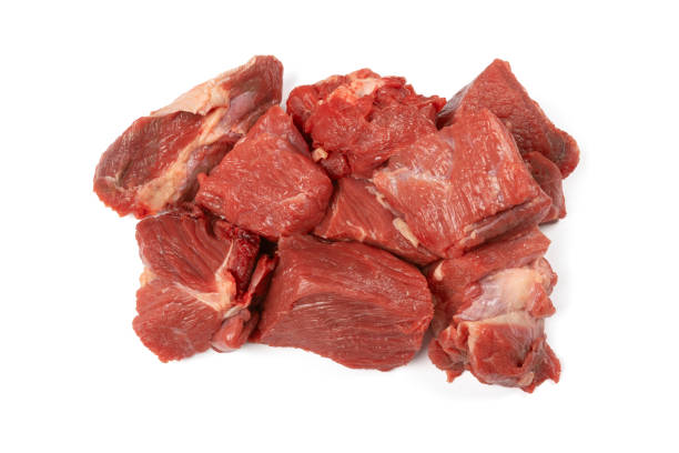 istock pieces of raw beef, isolated on a white background 1931966075