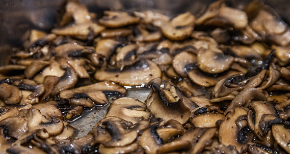 Cooked button mushroom, a vegetable that is served as an accompaniment to meat for example, and easy to cook