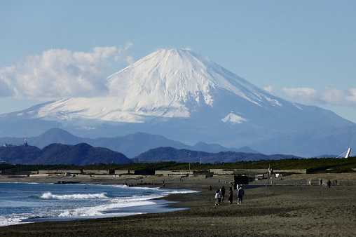 Kanagawa, Japan, 2024/01/04 Japan's famous landmark Mt. Fuji, distant view from the Shonan coast