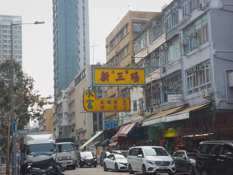 Hong Kong, China - January 12 2024: Old large wall hanging sign in kowloon City, Hong Kong.