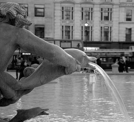 Photo of water fountain in black and white.