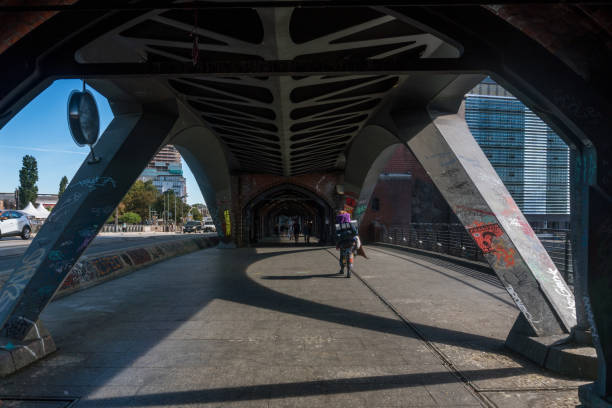 Berlin, Germany-august 10, 2022:Oberbaum Bridge in Berlin during a sunny day, featuring the artwork \
