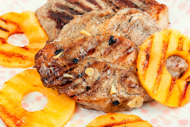 istock Grilled meat steak with ananas. 1932121765