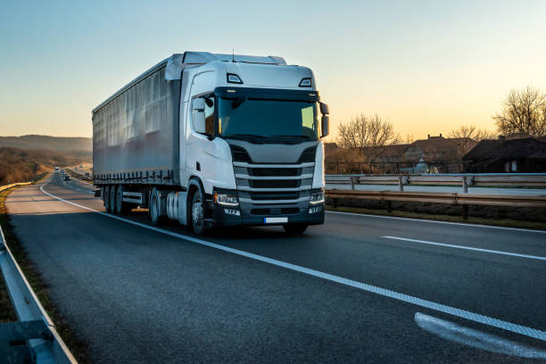istock Big semi trailer truck on a highway 1932167641