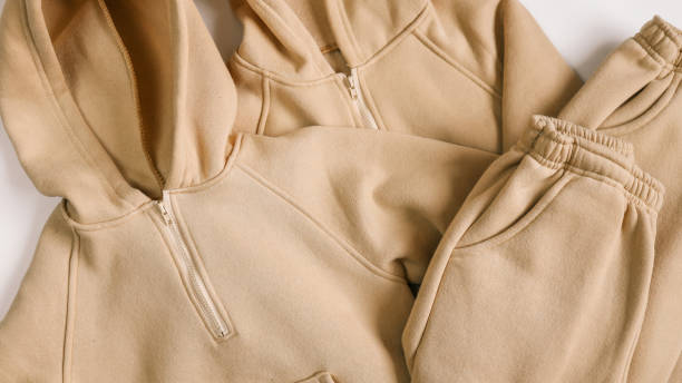 istock Children's tracksuits on a white background, advertising 1932179225
