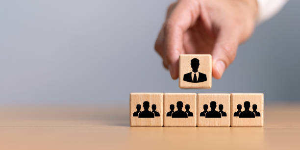 istock Organization and team structure symbolized with cubes, leadership manager team of company, business organizational hierarchy job concept, president job change control 1932251566