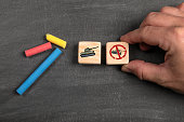 Stop War Concept. Wooden blocks on a dark chalkboard background