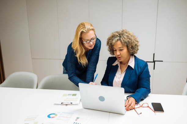 istock Business people and teamwork in modern corporate office 1932272068