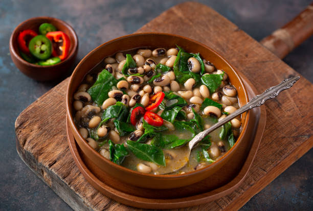 istock US Southern black-eye peas and collard greens on a rustic cutting board; vegan 1932318534