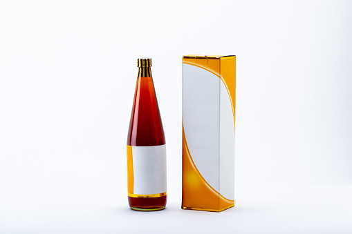 Packaging honey bottle on the white background.