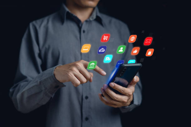 istock Online shopping on smartphone application technology. Man happy and touching on virtual app screen with mobile phone. Choose products, payment, sell products, purchase on the internet at home 1932352677